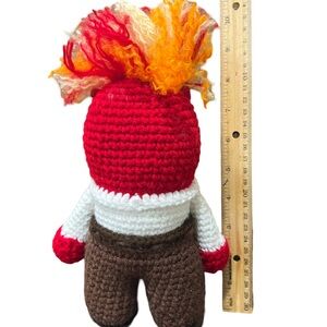 Handmade Crochet Doll with Red and Brown Accents